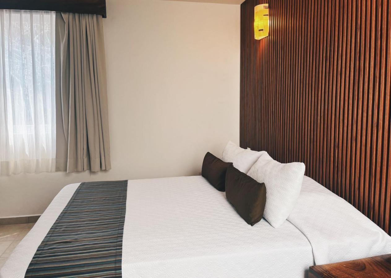 Отель Quinta Bella Huatulco Экстерьер фото