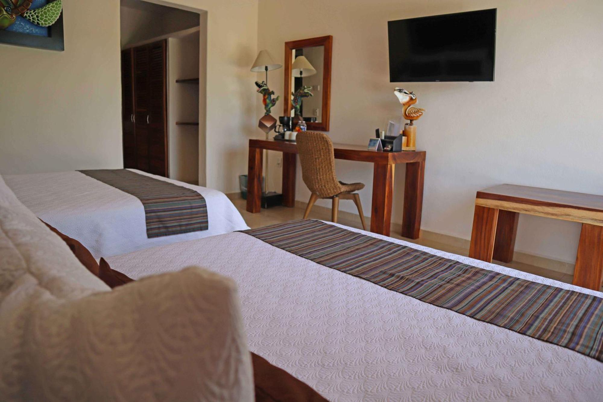 Отель Quinta Bella Huatulco Экстерьер фото